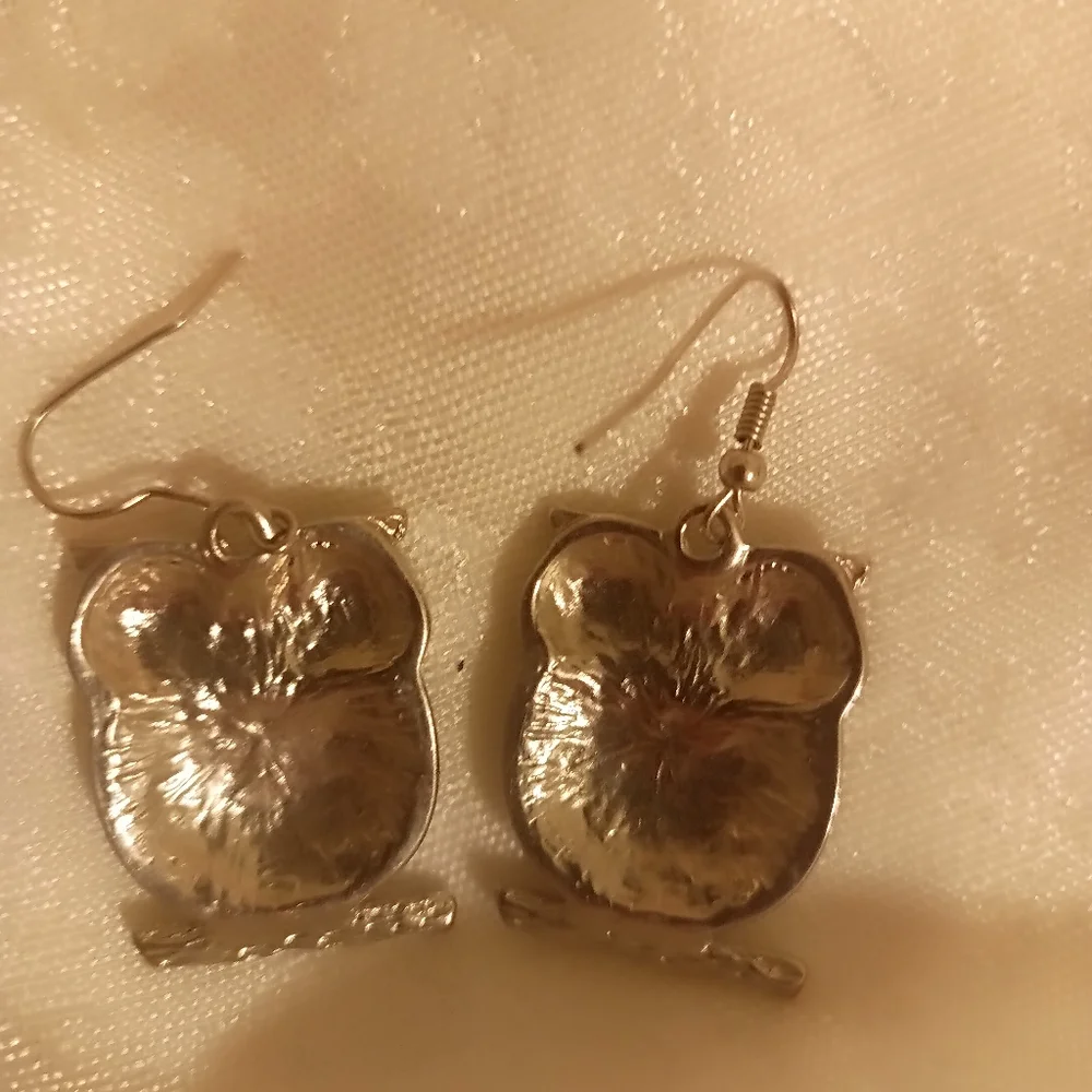 Two toned silver and gold tone green eye owl dangle earrings